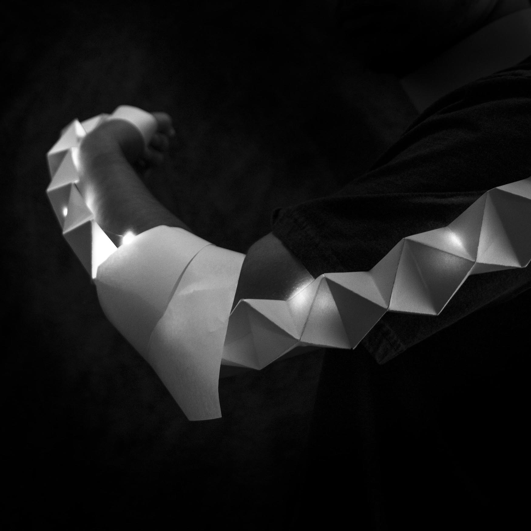 worn paper garment with lights