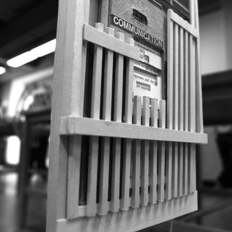 wooden slipcase structure with book inside