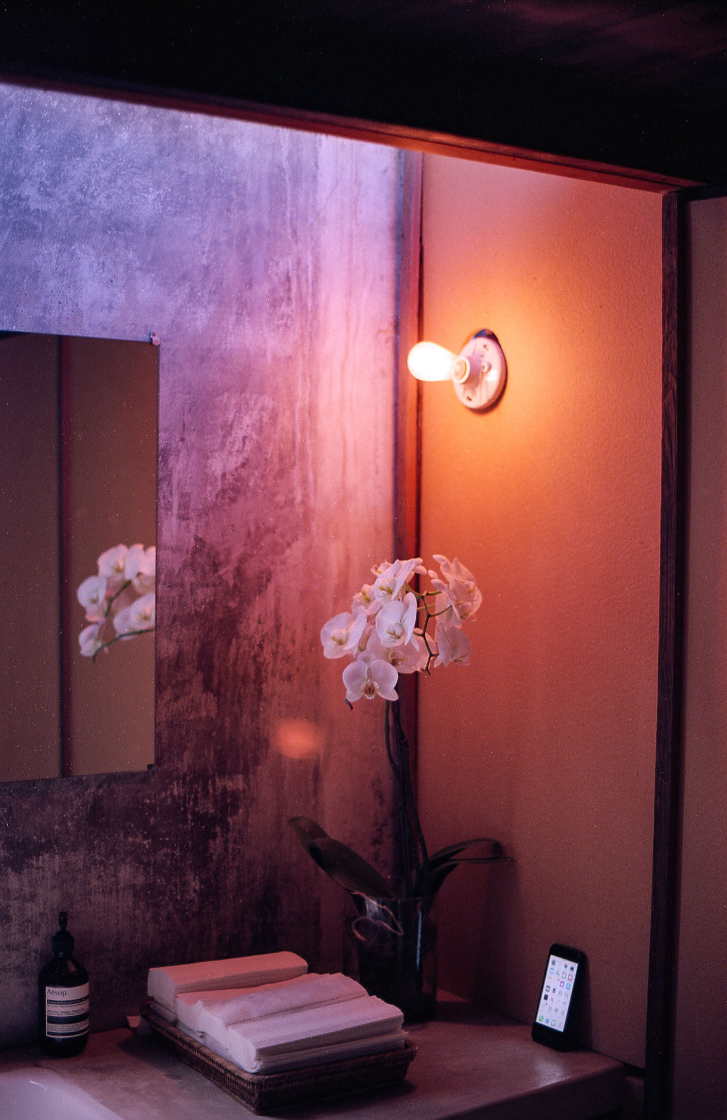 light fixture above mirror and sink in schindler house los angeles, 35mm film