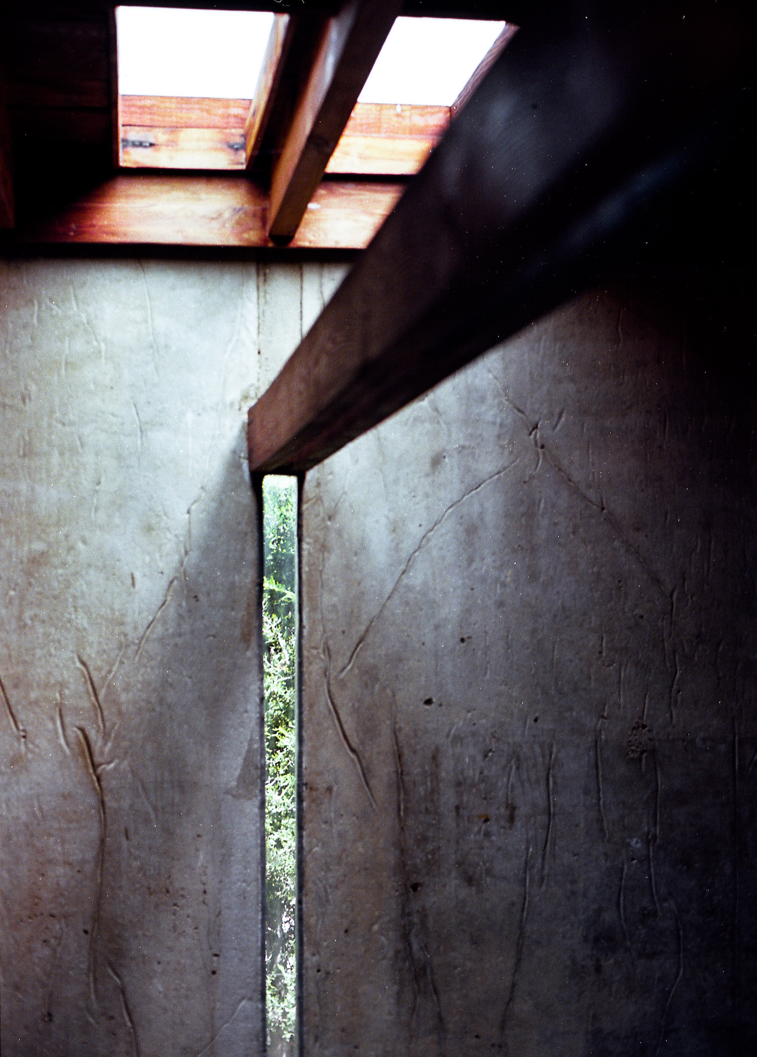 beam beneath a skylight connecting to wall above a slender window, schindler house los angeles, 35mm film
