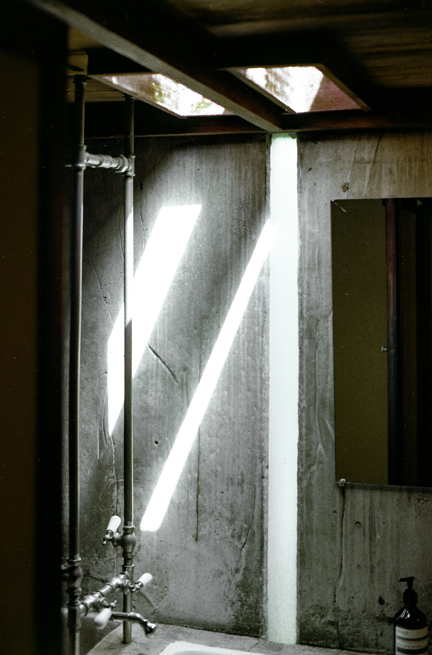 diagonal light streak from skylight in schindler house los angeles, 35mm film