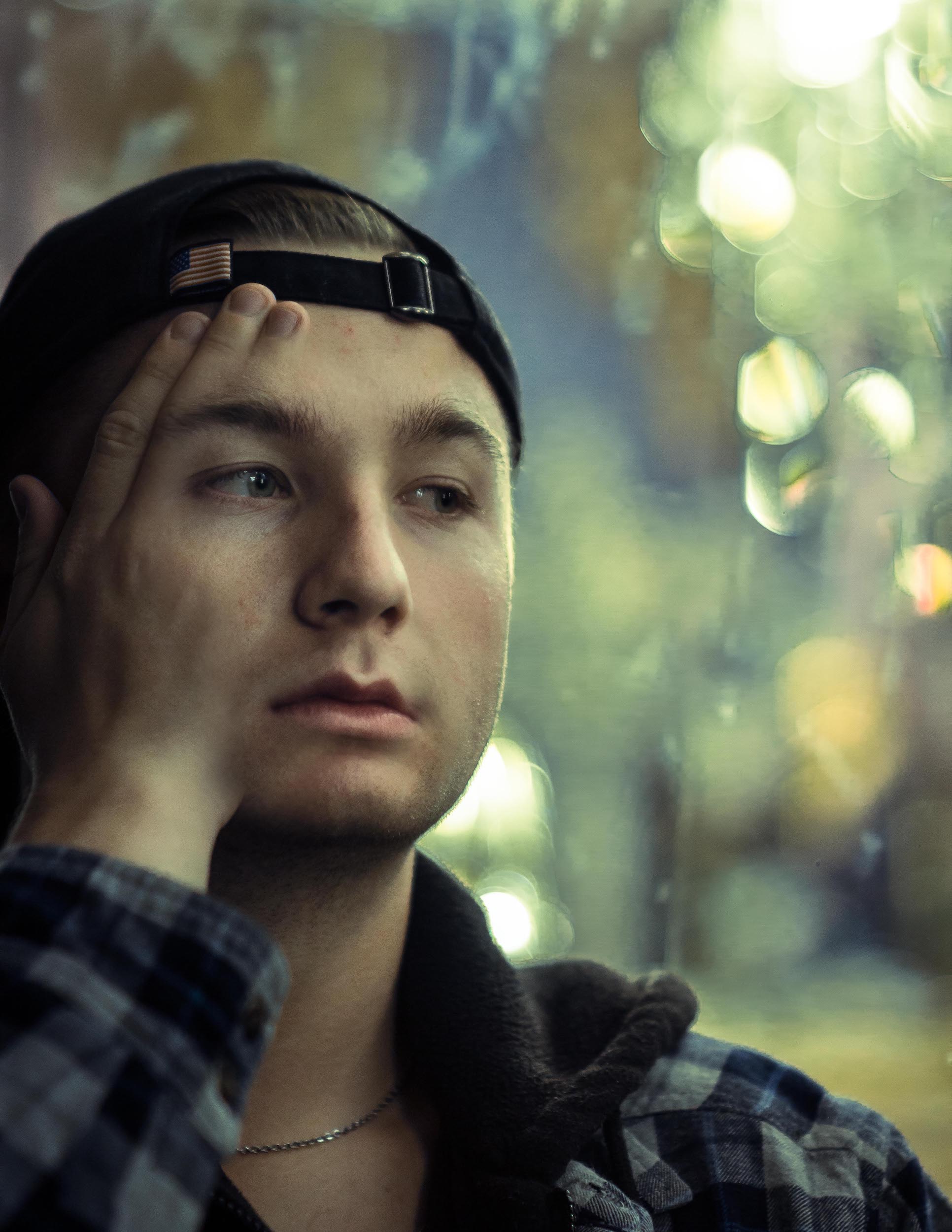 male figure with hand blending into side of face, photoshop edit